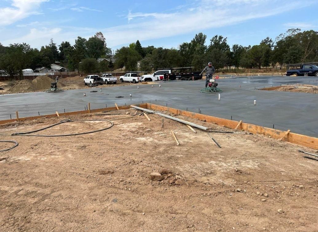 Structural slab &middot; power-trowel finish